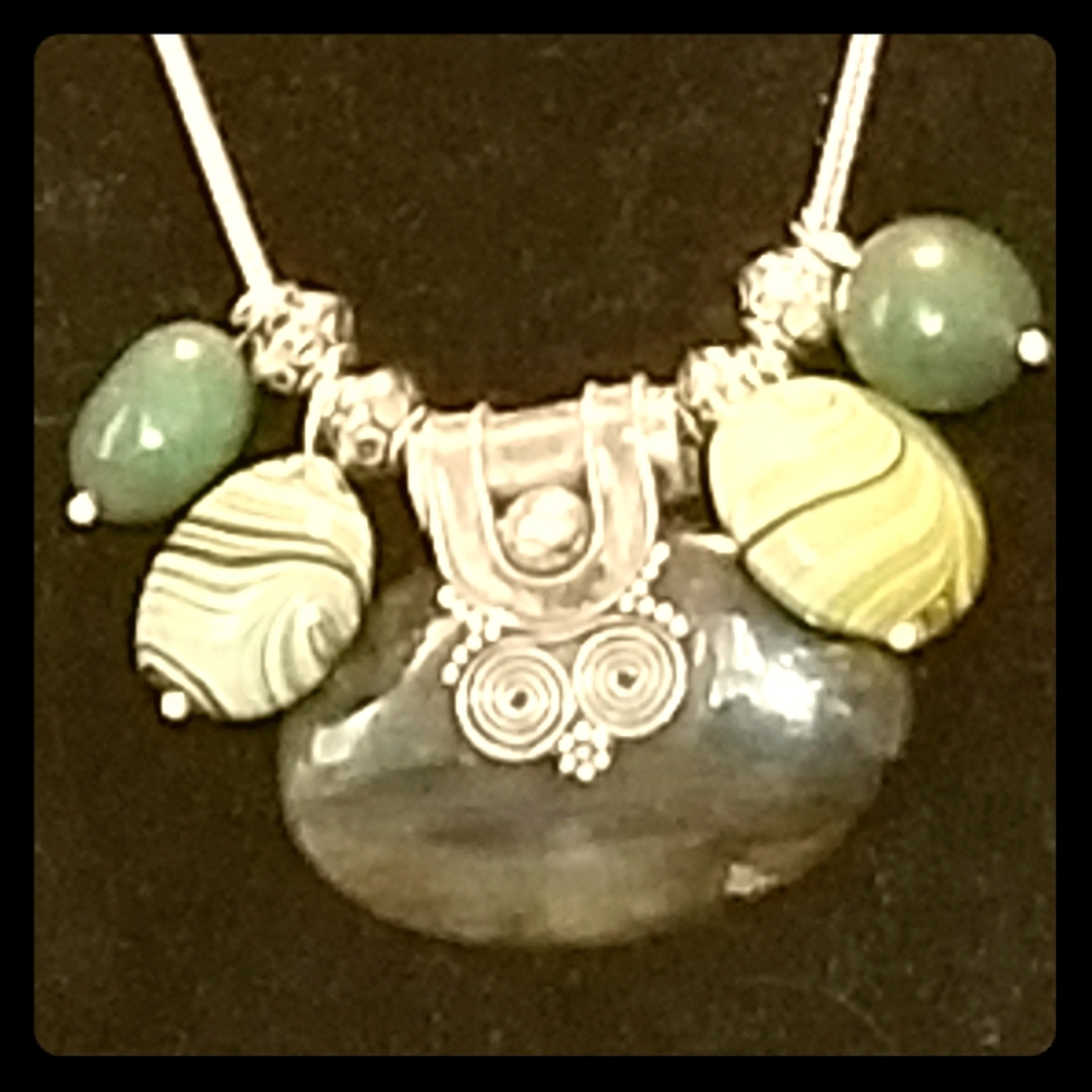 Green jadeite pendant with sterling silver chain